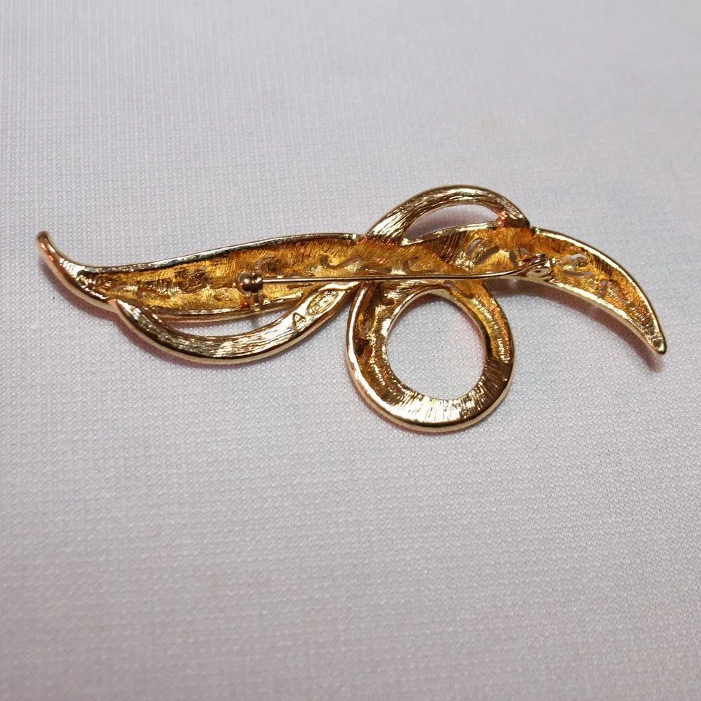 Avon Silver and Gold Tone Swirl Brooch with Rhinestones